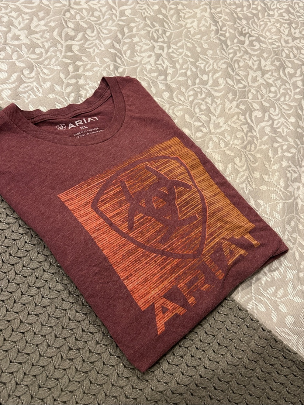 Ariat Men’s Maroon Short-Sleeve Logo Crew Shirt with Orange Graphic